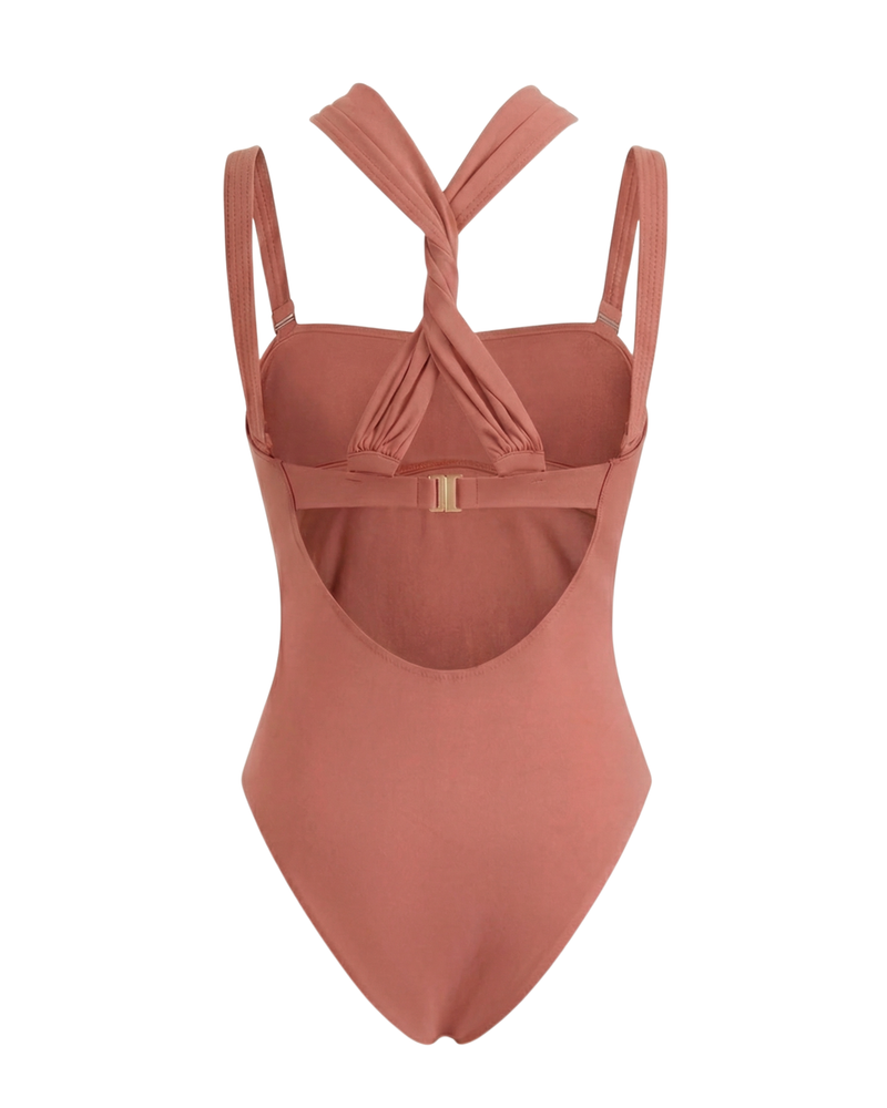 Brown swimsuit with a unique design on a white background